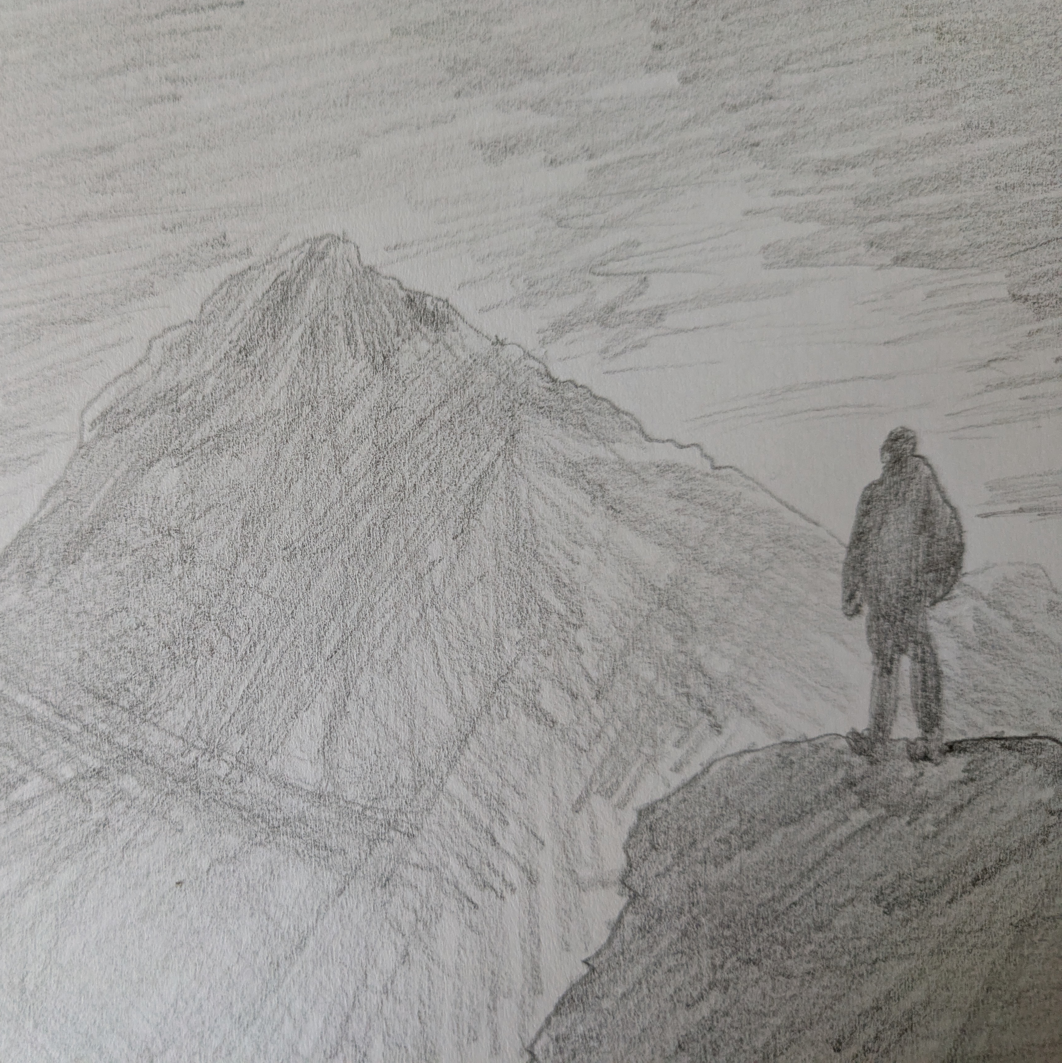 A sketch of a man atop a small mountain staring at a big one