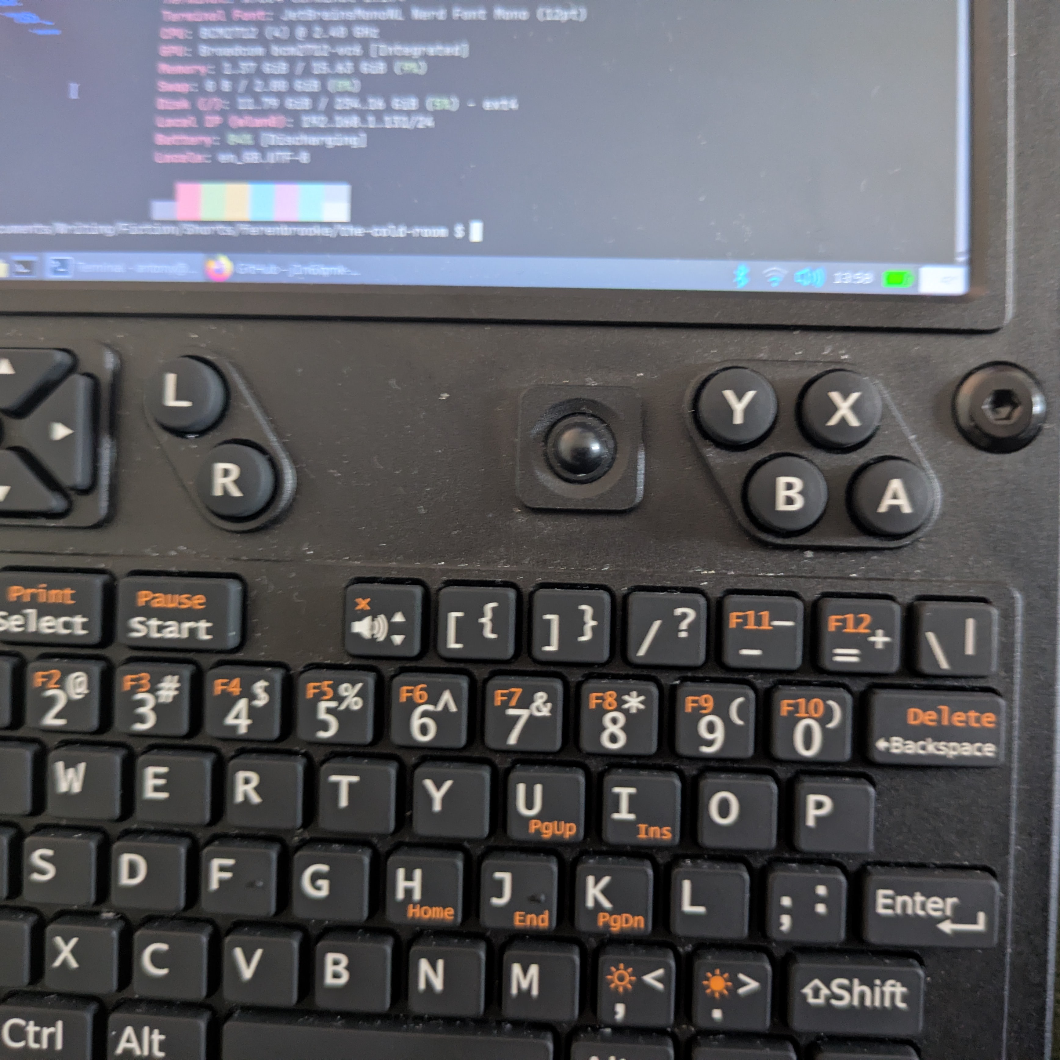 A photo of the uConsole trackball.