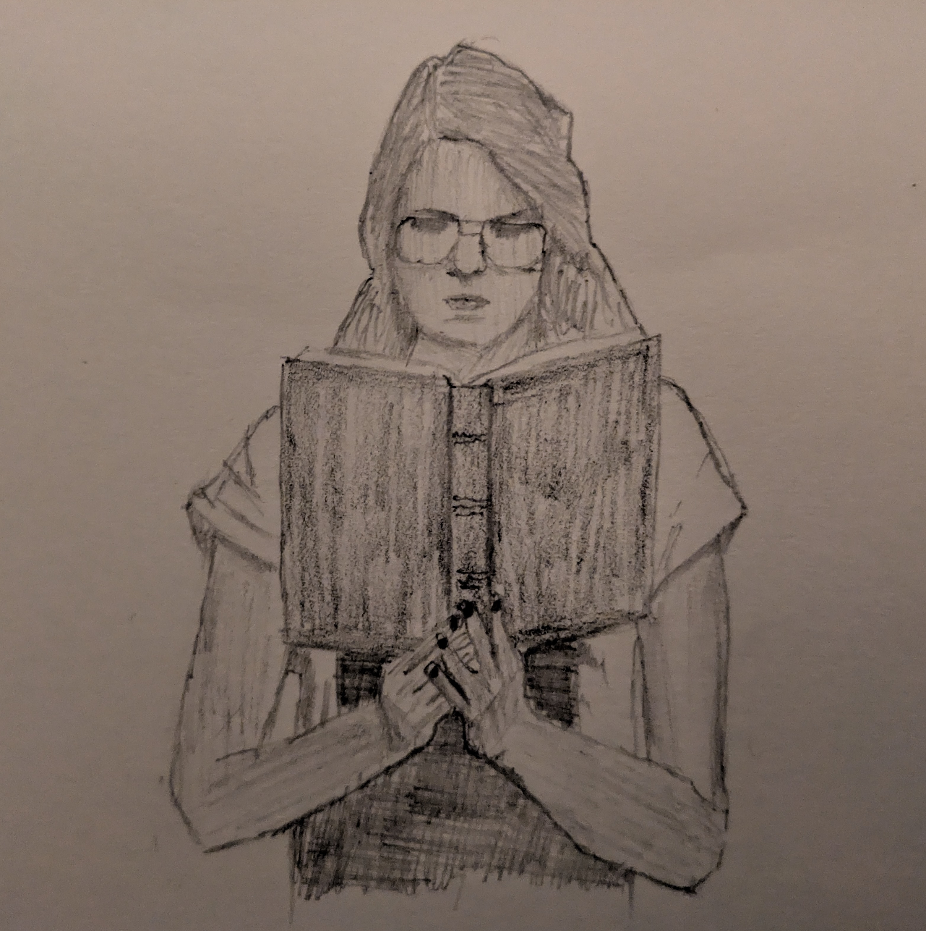 A sketch of a woman reading a book